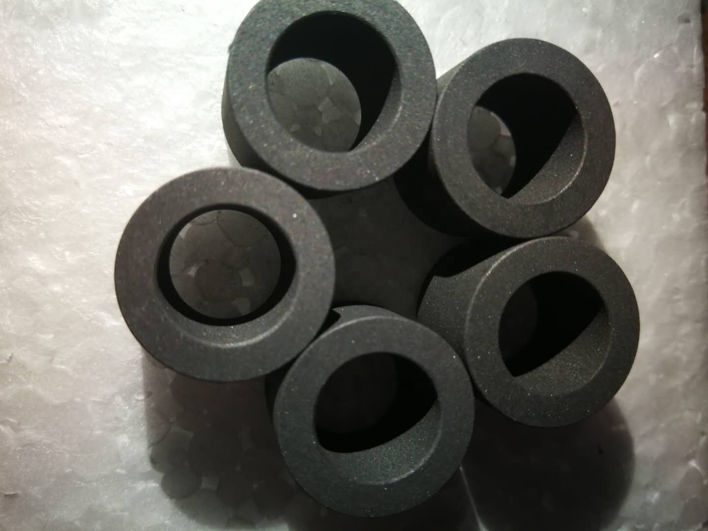 Antimony impregnated graphite bearings